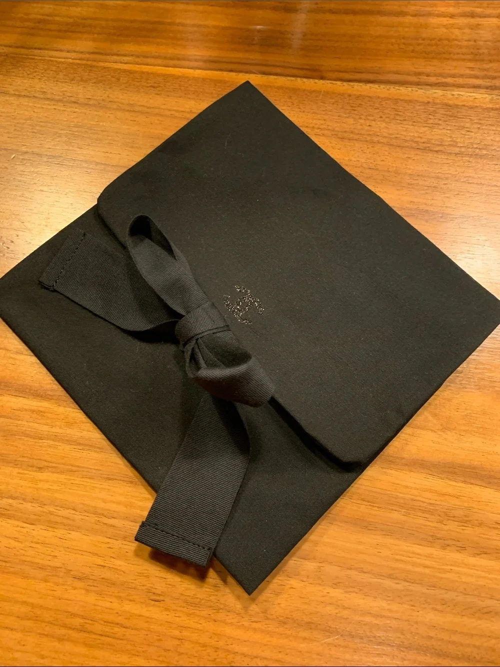 Authentic  black Chanel rare pouch with CC sparky logo with closing strops.Must!